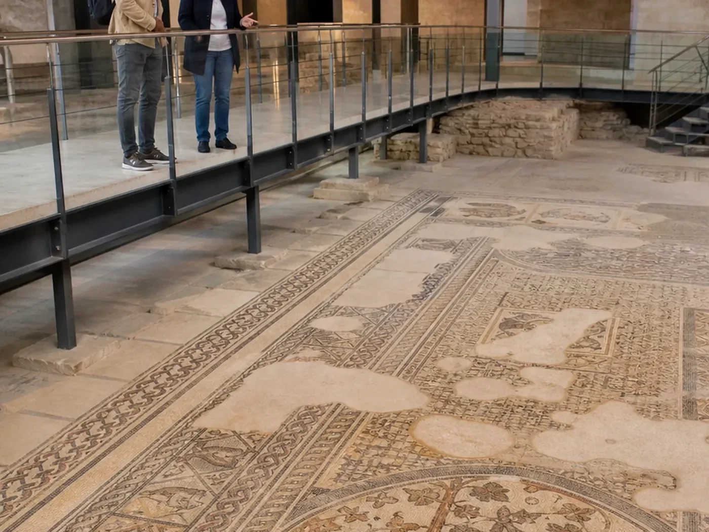 Visitors view the preserved mosaics inside the Bishop’s Basilica of Philippopolis in Plovdiv.